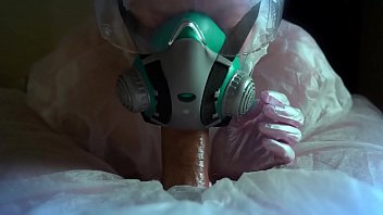 A Girl In A Protective Suit And A Gas Mask Sucks A Dick Sex During The Covid 19 Epidemic